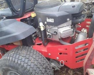 42 inch cut Simplicity zero turn mower with Briggs and Stratton motor, need a tune-up and new blades plus has some damage to plastic to right side plastic on cup holder