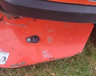 42 inch cut Simplicity zero turn mower with Briggs and Stratton motor, need a tune-up and new blades plus has some damage to plastic to right side plastic on cup holder