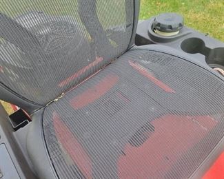 42 inch cut Simplicity zero turn mower with Briggs and Stratton motor, need a tune-up and new blades plus has some damage to plastic to right side plastic on cup holder