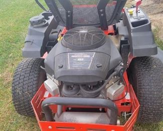 42 inch cut Simplicity zero turn mower with Briggs and Stratton motor, need a tune-up and new blades plus has some damage to plastic to right side plastic on cup holder
