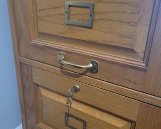 A beautiful Oak file  cabinet with lock and key 2 drawer