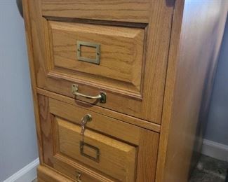 A beautiful Oak file  cabinet with lock and key 2 drawer