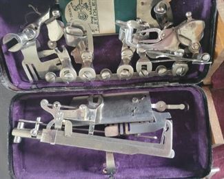 2 sewing boxes with attachments