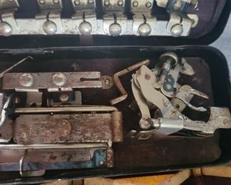 2 sewing boxes with attachments