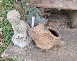 Concrete child statuary and frog plater with wire decor