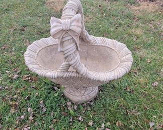 Concrete basket planter with bow larger than it appears