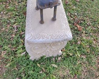 Concrete bench and yard art