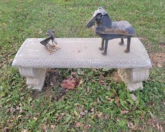 Concrete bench and yard art