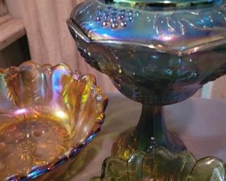 Carnival glass, amber glass, and various candy bowls