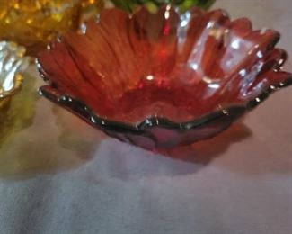Carnival glass, amber glass, and various candy bowls