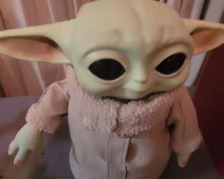 The Child Baby Yoda Star Wars battery operated moving parts toy take AA batteries