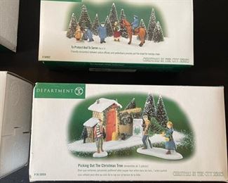 4 pc Dept. 56 Christmas in the City Series figurines. Visiting the nativity, to protect and to serve, handsome cab, picking out the Christmas tree