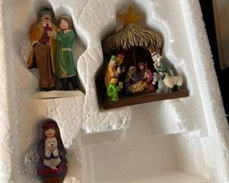 4 pc Dept. 56 Christmas in the City Series figurines. Visiting the nativity, to protect and to serve, handsome cab, picking out the Christmas tree