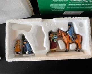 4 pc Dept. 56 Christmas in the City Series figurines. Visiting the nativity, to protect and to serve, handsome cab, picking out the Christmas tree