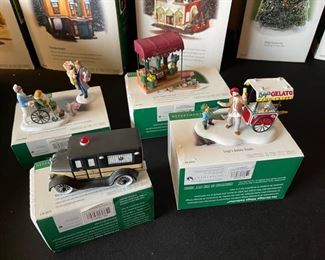 4pc Dept. 56 Christmas in the City figurines. Bringing home the baby, The city ambulance, Luigis gelato treats, fresh flowers for sale