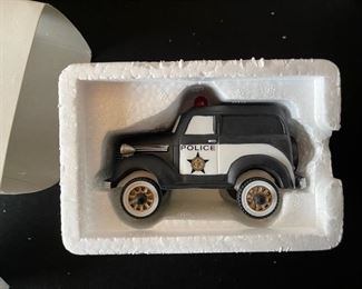 6pc Dept. 56 Christmas in the City Series. City taxi, 1919 Ford model T, city police car, radio city Rockettes, dressed for success, rest ye Merry gentlemen