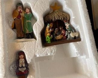 4 pc Dept. 56 Christmas in the City Series figurines. Visiting the nativity, to protect and to serve, handsome cab, picking out the Christmas tree