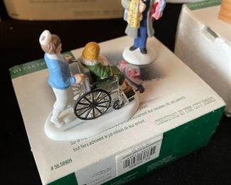 4pc Dept. 56 Christmas in the City figurines. Bringing home the baby, The city ambulance, Luigis gelato treats, fresh flowers for sale