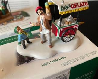 4pc Dept. 56 Christmas in the City figurines. Bringing home the baby, The city ambulance, Luigis gelato treats, fresh flowers for sale
