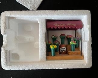 4pc Dept. 56 Christmas in the City figurines. Bringing home the baby, The city ambulance, Luigis gelato treats, fresh flowers for sale