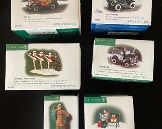 6pc Dept. 56 Christmas in the City Series. City taxi, 1919 Ford model T, city police car, radio city Rockettes, dressed for success, rest ye Merry gentlemen