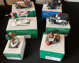 6pc Dept. 56 Christmas in the City Series. City taxi, 1919 Ford model T, city police car, radio city Rockettes, dressed for success, rest ye Merry gentlemen