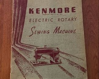 Kenmore Electric Rotary Sewing Machine in Cabinet with Chair, Accessory rack, manuals & Pamphlets Closed 29"W x 19.5"D x 30"H Opened 58"W Call'