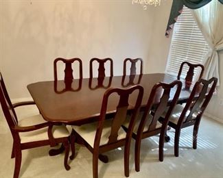 Cherry Two Pedestal Dining Table with 8 Chairs
Comes with 2 Leaves & 8 Table Pads
There are 2 Armchairs & 6 Side Chairs
Matches Sideboard in Lot #25
With leaves, the table length is 92in L x 30in H x 42in W