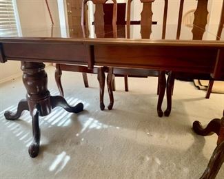 Cherry Two Pedestal Dining Table with 8 Chairs
Comes with 2 Leaves & 8 Table Pads
There are 2 Armchairs & 6 Side Chairs
Matches Sideboard in Lot #25
With leaves, the table length is 92in L x 30in H x 42in W