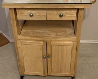 Rolling Kitchen Island has Storage & a Glass Top