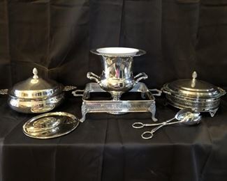 (6) Silver Plate Serving Pieces: Urn Wine Cooler, Chafing Dish with Extra Insert, Tongs, Round Platter, & Stand for Glass Casserole Dish