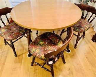 (5) 48in Round Table & 4-Cushioned Chairs