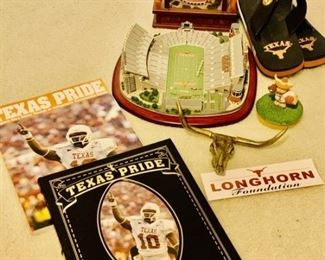 (7) Lot For The University of Texas Fan: Clock, Replica of Stadium, Brass Longhorn, Texas Pride Table Book, UT Flip Flops, Miniature Bevo Statue, and Sticker.
