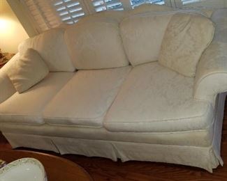 white cloth sofa