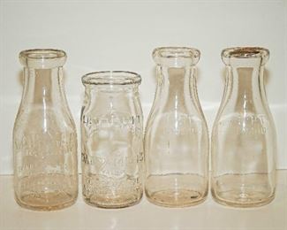 4 Vintage milk bottles