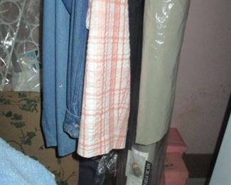 NEW CLOTHING WITH TAGS STILL ON THEM 