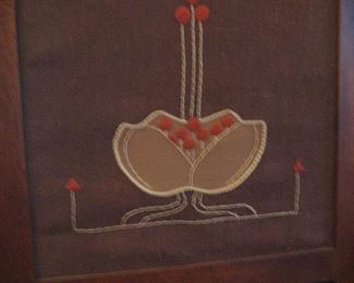 Close up of embroidered inset of Stickley tri-fold screen