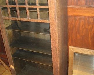 Arts and Crafts glass front cabinet and oak framed mirror