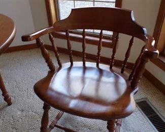 closeup of maple dining room chairs
