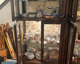 Great lighted oriental cabinets full of Japanese ware
