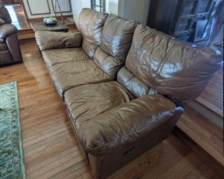 ITEM # 18 Leather 3 Seater couch with 2 end recliners. Dimensions: 80" L x 34" W Asking Price $ 100