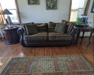 ITEM # 23 - Leather and Fabric Nail Head Couch. Dimensions: 39" W x 87" L. Asking Price $275