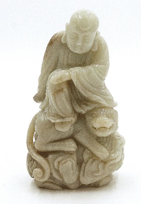 Chinese 20th C.   Carved Nephrite Jade of a Lohan on the back of a Tiger