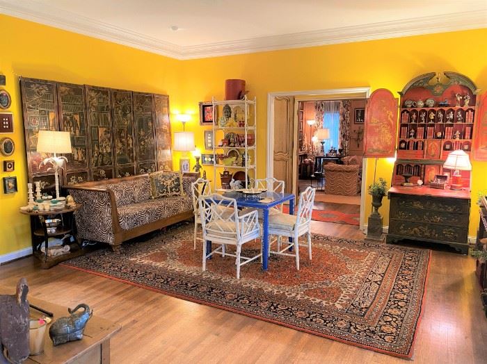 THE PICTURES SAY IT ALL!  Antique Chinoiserie secretary, blue patent leather game table, McGuire style chairs, Chinese screen, Zebra sofa, Oriental rug, Intaglio reliefs…amazing!