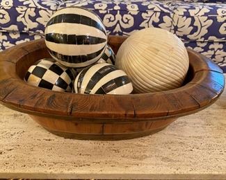 Antique wooden bowl with bone balls