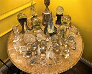 Collection of crystal balls, obelisks, small bowls and decorative items
