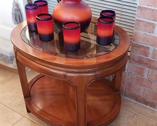 Oval table with glass top insert.  Mexican glassware