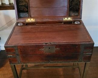 Antique writing desk on stand