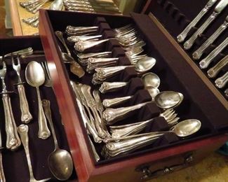 Over 128 pieces of Frank W. Smith "Newport Scroll" sterling silver flatware