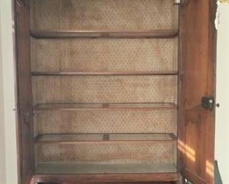 Upholstery added with removable shelving and extra glass protection on the bottom. 